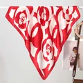 Elegant silk scarf with large red and white camellia floral print on a display stand - 70x70cm / Camellia Red
