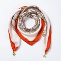 Square velvet scarf with orange scroll pattern and decorative golden metal pendants - Abstract Lily - Magnetic Buckle