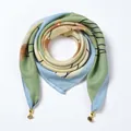 Detailed macro view of velvet scarf featuring herringbone texture and gold floral pendants - Green Ginkgo - Magnetic Buckle