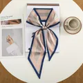 Polka dot silk scarf with navy stripes on a white table near a coffee cup - Navy Red Contrast Stripe Polka Dot (26)