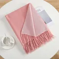 Detail of pink two-sided pashmina scarf with woven texture and elegant fringe edges - Soft Pink