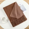 Close-up of caramel thick cashmere-like scarf with fringe details and soft texture - Mocha Brown