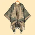 Detail shot of heavy floral knit shawl with elegant long fringes and premium texture - Green Khaki