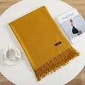 Soft mustard yellow cashmere scarf for women with handmade fringe and subtle label - Turmeric