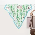 Elegant silk-like scarf with green heart print and blue border hanging on display - 70x70cm / Green