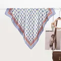 Elegant silk-like square scarf for women featuring blue polka dots and chain pattern - Chain Link Blue