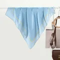Sky blue polka dot silk scarf with yellow edges hanging elegantly for women - Blue Polka Dot