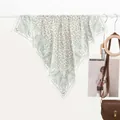 Light green paisley silk scarf with floral patterns elegantly draped for summer styling - Green
