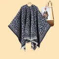 Detail of leopard print knit shawl featuring white fringe hem and reversible design - 130x150cm / Navy Blue Leopard