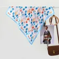 Floral tulip print silk scarf in white and blue, styled with a leather handbag - 70x70cm / Multicolor Tulip Blue
