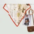 Floral print silk square scarf with orange borders and elegant botanical patterns - 70x70cm / Floral Red
