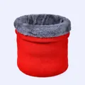 Detail of red knitted winter neck warmer showing thick grey faux fur lining and texture - Red