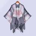 Detail of pink and grey plaid shawl with soft fringe trim hanging on a wooden hanger - Tops / Gray and Pink Plaid with Tassels / 130x150cm