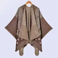Close-up of knit shawl detailing geometric patterns and soft brown textured fabric - Coffee
