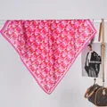 Detailed view of pink satin square scarf with heart print and premium rolled edges - Heart Pink