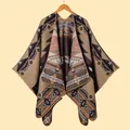 Close-up of thick geometric shawl with bohemian patterns on a wooden hanger - Khaki Geometric (2025123)