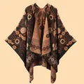 Close-up of thick jacquard knit poncho with vintage paisley floral patterns in warm tones - 135*155CM / Black Orange