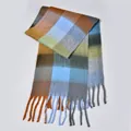 Rainbow plaid scarf in orange and blue with soft tassel trim and fuzzy knit texture - Grey/Blue