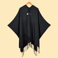 Elegant black knit shawl cape for women featuring classic leather buckle and long tassels - Black