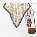 Vintage chain print silk scarf in beige and gold hanging with a retro brown bag - 70x70cm / Beige