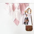 Floral satin silk square scarf in pink and white hanging with a stylish saddle bag - 70x70cm / Striped Color Block Purple
