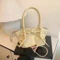 Sac seau beige crème avec détail de nœud et bandoulière réglable pour femmes - Jaune