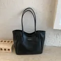 Borsa tote nera minimalista in ecopelle con logo RUITAOJIA e spalline sottili - Nero senza Ciondolo
