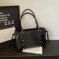 Vintage black underarm tote bag in glossy leather with silver studs and double straps - Black Without Charm