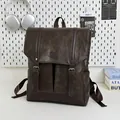 Zaino retrò marrone scuro in pelle PU con fibbie decorative e maniglia superiore - Marrone Senza Ciondolo