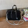 Chic black plush faux fur crossbody pillow bag with silver woven rope shoulder strap - No Pendant / Black