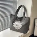 Grey canvas tote bag with daisy embroidery and Maodo lettering detail - Dark Brown