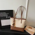 Contrast color canvas tote bag with brown leather trim and wooden bead tassel decoration - Cream White with Pendant