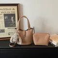 Brown litchi grain leather bucket bag with matching pouch and plush rabbit pendant - With Pendant / Khaki