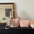 Pale pink lychee grain leather bucket bag with silver clasp and cute rabbit charm - With Pendant / Pink