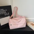 Pink casual nylon crossbody bag with pleated texture and adjustable wide shoulder strap - Pink