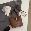 Dark brown lychee pattern leather bucket bag with silver buckle and adjustable strap - Without Pendant / Coffee