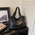 Gothic style black pleated tote bag with metal cross charm and adjustable shoulder strap - Black