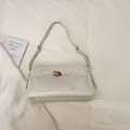 Retro cremeweiße Umhängetasche mit großer Kapazität aus glänzendem Leder und Metallschnalle - Weiß