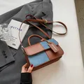 Brown leather and blue denim patchwork crossbody bag with top handle and gold tag - Brown Large / Large