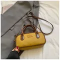 Chic ginger yellow boston bag with pebble grain leather and contrast brown handles - Yellow Brown No Pendant