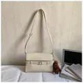 Creamy white leather tote bag with vintage buckle and brown plush horse charm - Cream White with Pendant