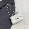 White quilted faux leather chain crossbody bag with silver hardware and turn-lock - White