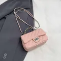 Chic pink quilted chain crossbody bag in premium faux leather with metallic turn-lock - Pink