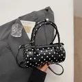 French vintage cylinder handbag with classic black and white polka dots and glossy finish - No Pendant / Black