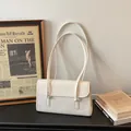 Minimalist cream white PU leather shoulder bag with sleek rectangular flap design - Off White