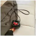 Mini zwarte crossbodytas met rood paardenborduurwerk en strik in glanzende afwerking - Zwart