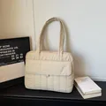 Quilted beige laptop shoulder bag with front flap pocket and minimalist commute style - Off-white