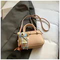 Apricot litchi grain handbag with adjustable strap and cute teddy bear pendant - Pink With Pendant