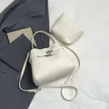 White lychee pattern leather bucket bag with top handle and matching small pouch - Main Bag and Pouch / White