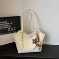Creamy white women's shoulder tote bag with wave edge design and cute bear charm - White With Pendant